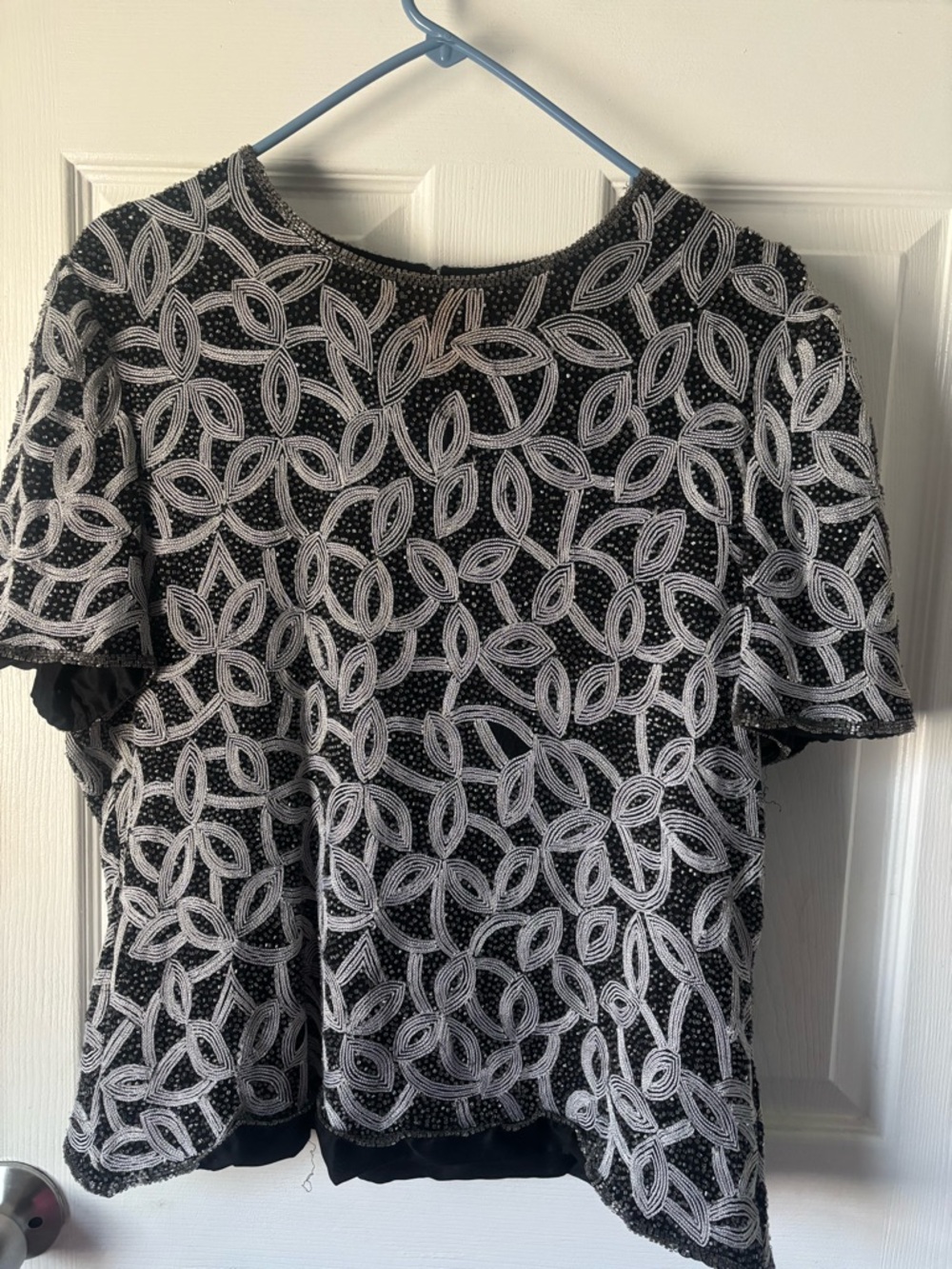 Embroidered Black Short-Sleeve Women's Top with White Loop Pattern